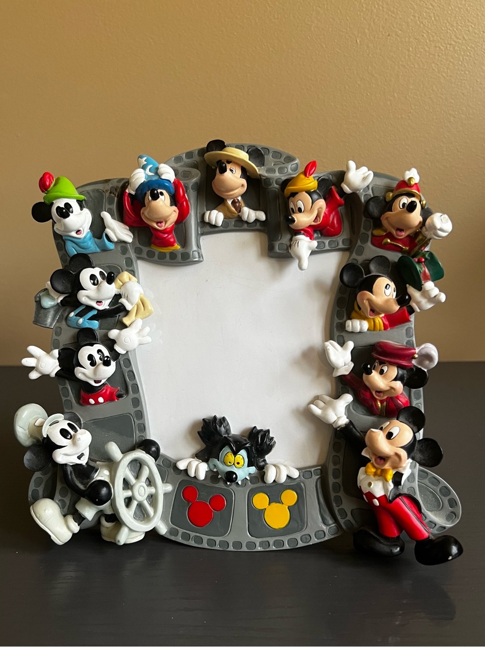 Disney Mickey Mouse "Through the Years" 3D resin photo frame.